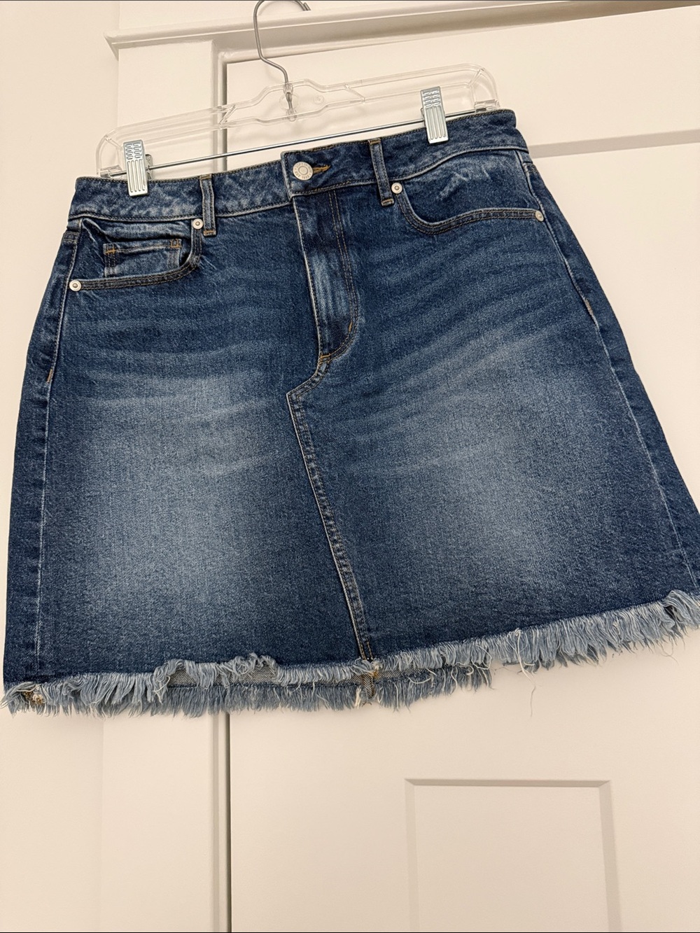 LOFT Distressed Denim A-Line Mini Skirt - Blue. Size 6. Waist 32” length 17”